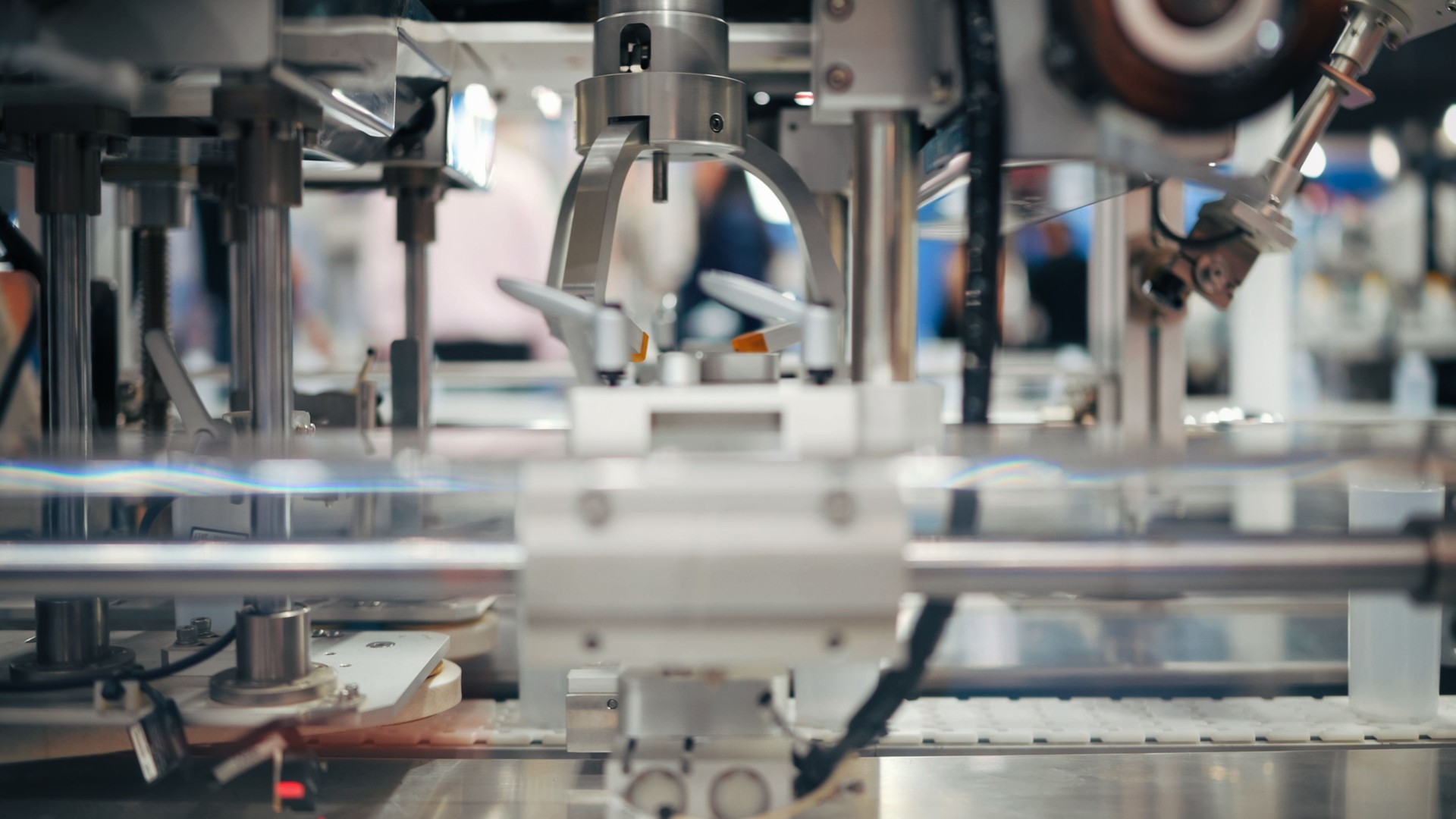 robotic filling and capping machine in sterile plastic bottle production line | automation in cosmetic, chemical, or medical product packaging